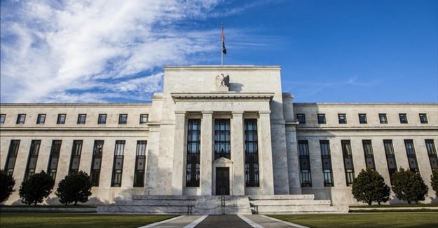Fed faiz oranını değiştirmedi, varlık alımlarının hızında azalmaya gitti